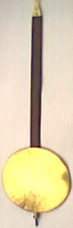 Dřevěné kyvadlo s čočkou